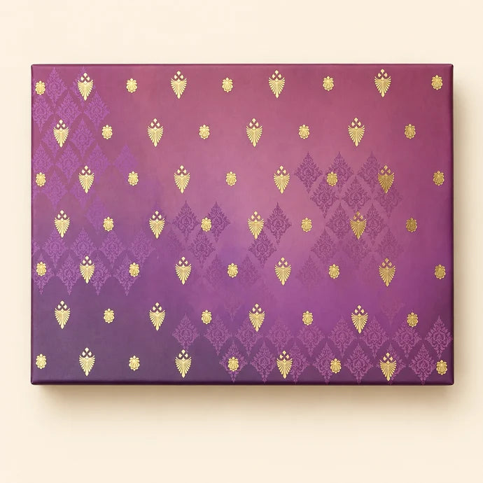 MM Mithaiwala 3 Jar Purple Box, a closed purple gift box with repeating golden motifs.