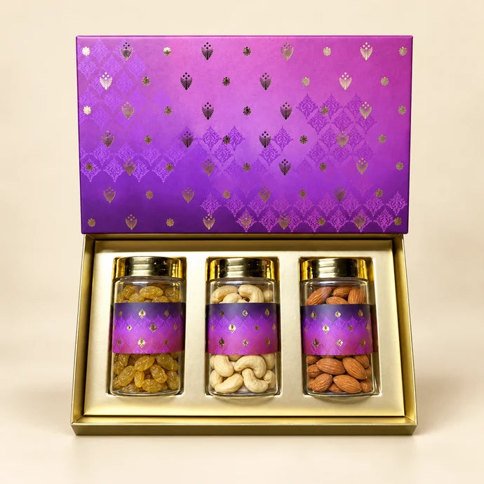 MM Mithaiwala 3 Jar Purple Box, a closed purple gift box with repeating golden motifs.