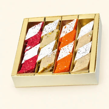 MM Mithaiwala Assorted Kaju Katli Box with colourful diamond-shaped katli topped with silver leaf.