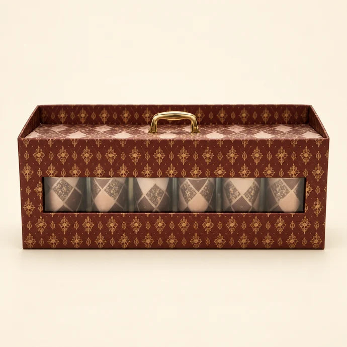 MM Mithaiwala Maroon Gift Carrier with golden motifs, a clear front window and a golden handle.