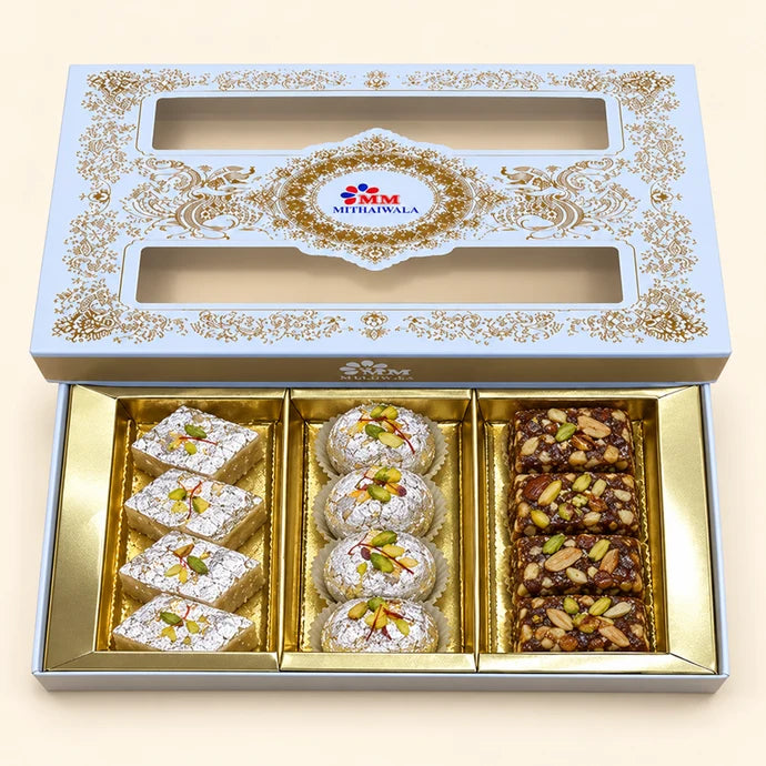 MM Mithaiwala MM Fancy Box 1/4 Kg with ornate golden patterns and two windows showing assorted sweets.
