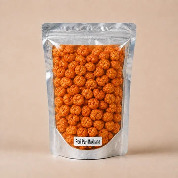 MM Mithaiwala Peri Peri Makhana in a silver pouch showing orange-red seasoned makhana through its clear front.