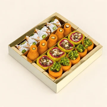 MM Mithaiwala Rajashahi Box with colourful nut-garnished mithai arranged in an open gold gift box.